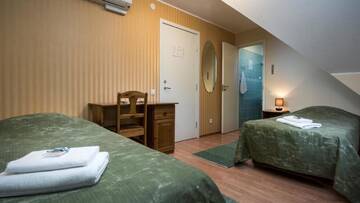 Фото номера Двухместный номер с 2 отдельными кроватями Мини-отель Sangaste Rukki Maja Guesthouse г. Сангасте 4