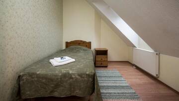Фото номера Двухместный номер с 2 отдельными кроватями Мини-отель Sangaste Rukki Maja Guesthouse г. Сангасте 7